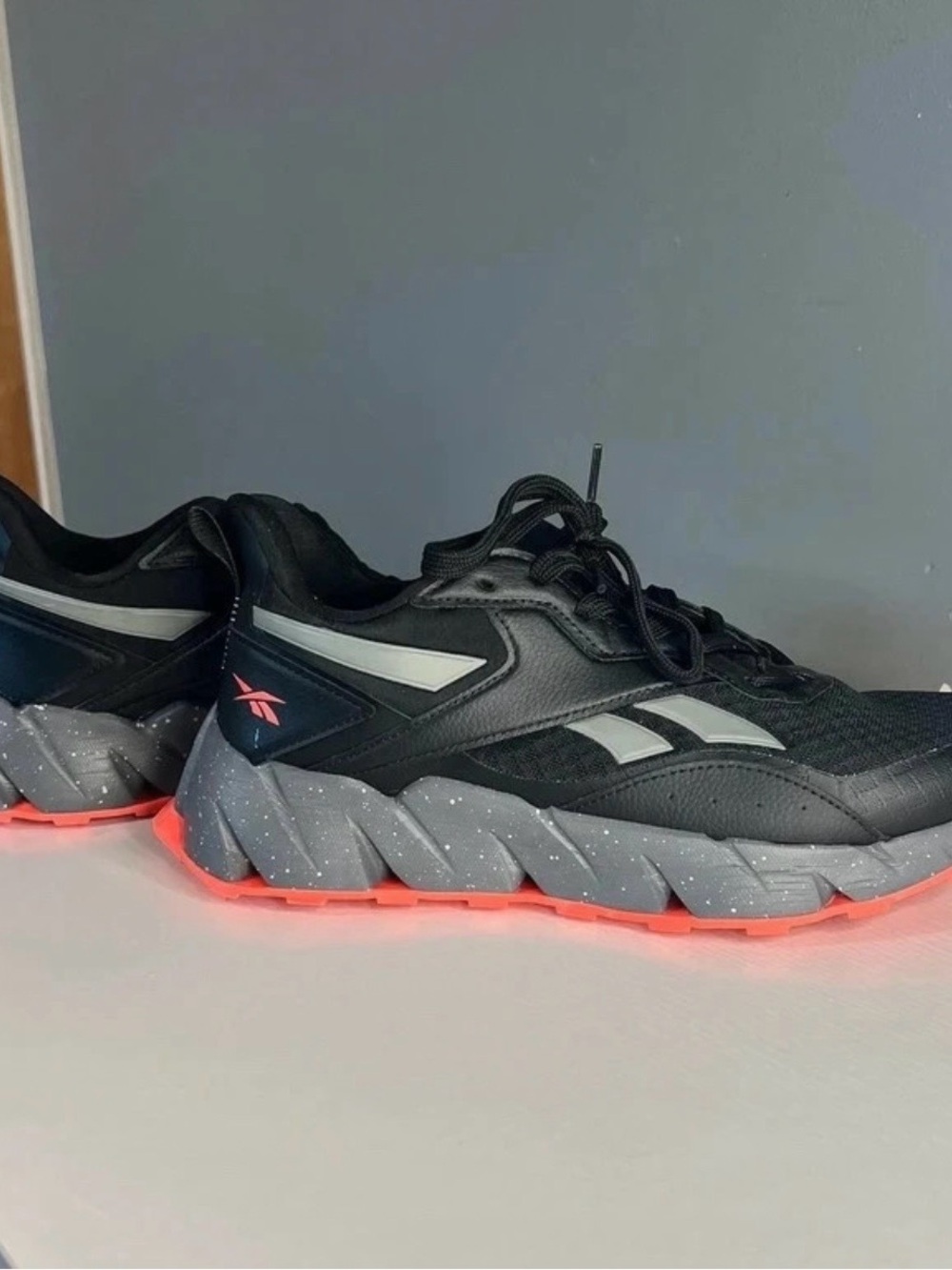 Men’s Reebok Black Gray Athletic Sneakers with Coral Accent